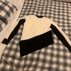 Barely worn black and white express asymmetrical sweater very soft.